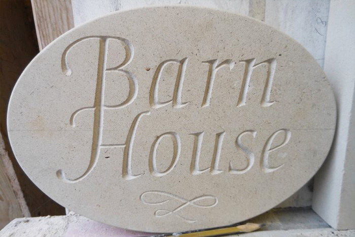 hand carved stone house signs